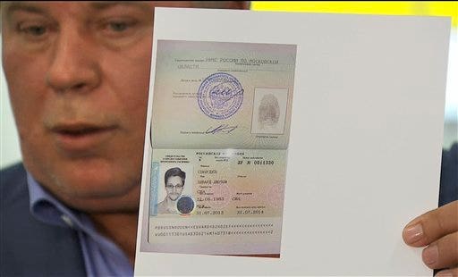 AP photo: Russian lawyer Anatoly Kucherena with Snowden document