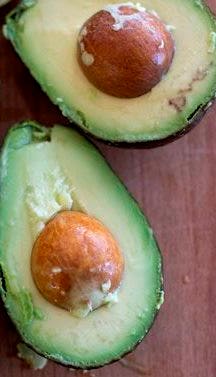 This Dec. 15, 2014 photo shows avocados in Concord, N.H. There are multiple ways to serve up guacamole for the Super Bowl. (AP Photo/Matthew Mead)