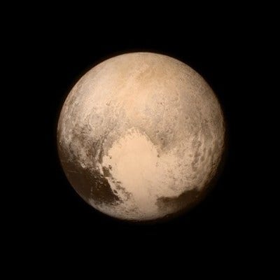 This July 13, 2015 image provided by NASA shows Pluto from the New Horizons spacecraft.  The United States is now the only nation to visit every single planet in the solar system. Pluto was No. 9 in the lineup when New Horizons departed Cape Canaveral, Fla, on Jan. 19, 2006  (NASA via AP)